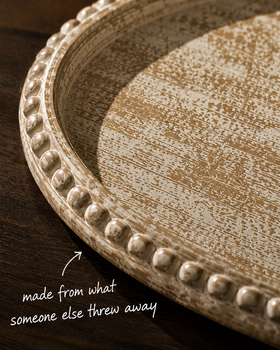 Close-up of the oval tray's woven-looking surface